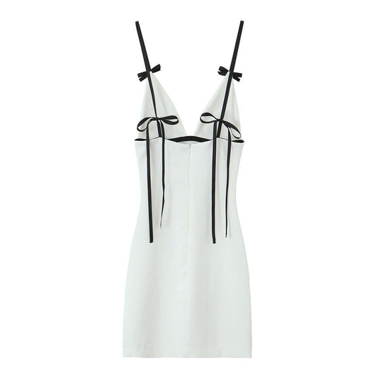 Women's suspender dress w/ bow ties